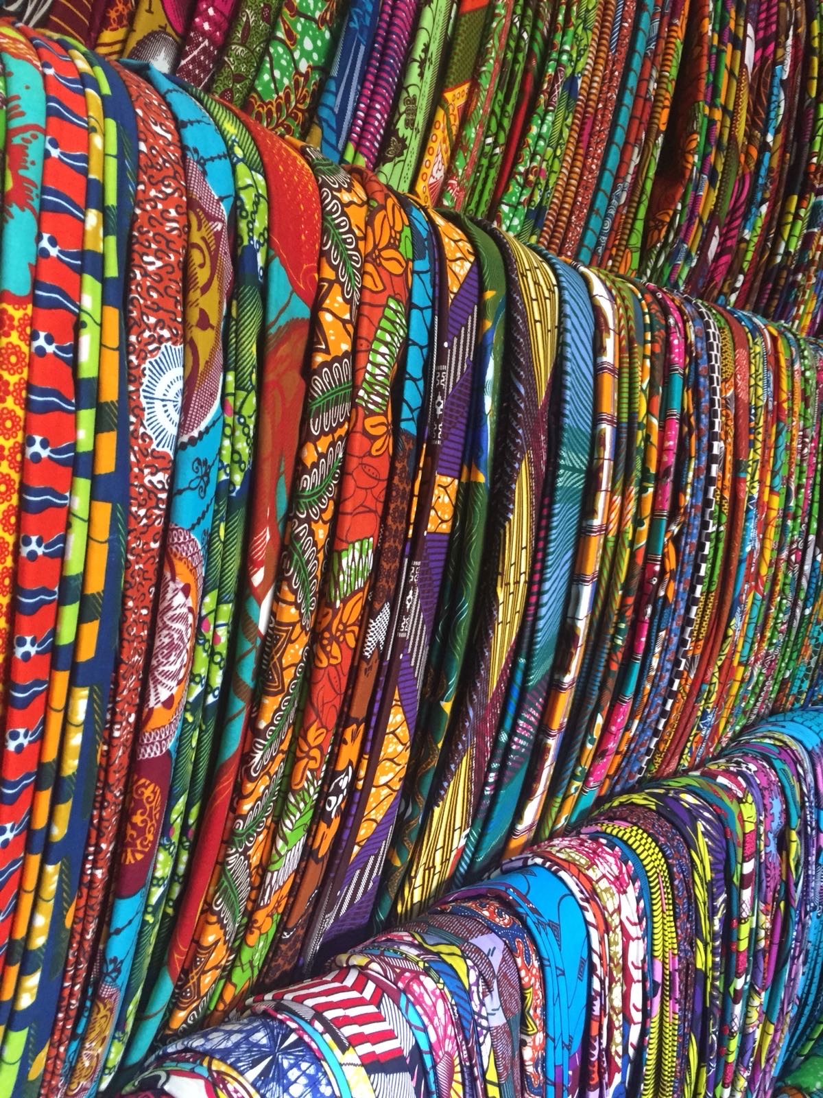 Colorful patterned fabrics photographed while traveling