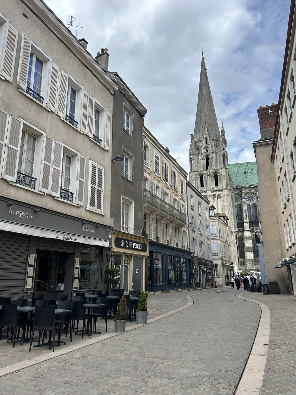 European street leading toward a cathedral